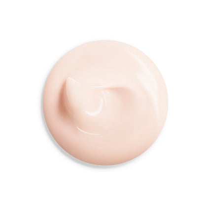 Close-up of smooth pink cream texture for Shiseido Vital Perfection Day Cream skincare